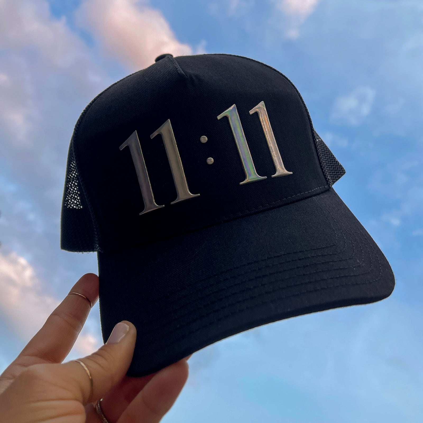 11:11 Manifestation Trucker Hat in Jet Setter Black